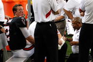 ATLANTA - NOVEMBER 29:  Quarterback Matt Ryan #2 of the Atlanta Falcons has his right foot attended to during the first half against the Tampa Bay Buccaneers at Georgia Dome on November 29, 2009 in Atlanta, Georgia.  (Photo by Kevin C. Cox/Getty Images)