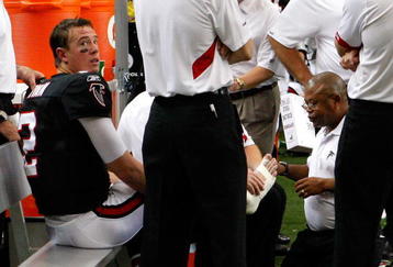 ATLANTA - NOVEMBER 29:  Quarterback Matt Ryan #2 of the Atlanta Falcons has his right foot attended to during the first half against the Tampa Bay Buccaneers at Georgia Dome on November 29, 2009 in Atlanta, Georgia.  (Photo by Kevin C. Cox/Getty Images)