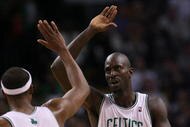 BOSTON - NOVEMBER 01:  Kevin Garnett #5 and Paul Pierce #34 of the Boston Celtics celebrate the win over the New Orleans Hornets at the TD Garden on November 1, 2009 in Boston, Massachusetts. The Celtics defeated the Hornets 97-87. NOTE TO USER: User expressly acknowledges and agrees that, by downloading and or using this photograph, User is consenting to the terms and conditions of the Getty Images License Agreement.  (Photo by Elsa/Getty Images)