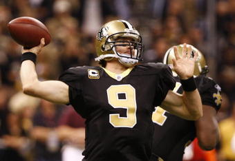 NEW ORLEANS - NOVEMBER 30: Quarterback Drew Brees #9 of the New Orleans Saintsthrows a 2-yard touchdown pass in the third quarter against the New England Patriots at Louisana Superdome on November 30, 2009 in New Orleans, Louisiana. (Photo by Scott Halleran/Getty Images)