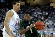 DETROIT - APRIL 06: Kalin Lucas #1 of the Michigan State Spartans drives on Danny Green #14 of the North Carolina Tar Heels during the 2009 NCAA Division I Men's Basketball National Championship game at Ford Field on April 6, 2009 in Detroit, Michigan. (Photo by Andy Lyons/Getty Images)