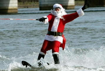 ARLINGTON, VA - DECEMBER 24:  Dressed as Santa Claus, Kerry Nistel water-skis on the waters of the Potomac River December 24, 2007 in Arlington, Virginia. This is the 22nd year Nistel has dressed as Santa and water-skied on Christmas Eve.  (Photo by Mark Wilson/Getty Images)