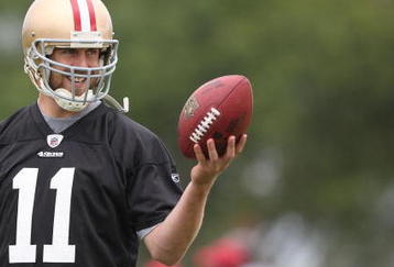 SANTA CLARA, CA - MAY 01:  Quarterback Alex Smith #11 of the San Francisco 49ers looks on during the 49ers Minicamp at their training facilities on May 1, 2009 in Santa Clara, California.  (Photo by Jed Jacobsohn/Getty Images)