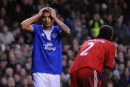LIVERPOOL, ENGLAND - NOVEMBER 29:  Tim Cahill of Everton reacts to a missed chance during the Barclays Premier League match between Everton and Liverpool at Goodison Park on November 29, 2009 in Liverpool, England. (Photo by Laurence Griffiths/Getty Images)