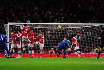 LONDON, ENGLAND - NOVEMBER 29:  Didier Drogba of Chelsea scores his second goal during the Barclays Premier League match between Arsenal and Chelsea at the Emirates Stadium on November 29, 2009 in London, England.  (Photo by Mike Hewitt/Getty Images)