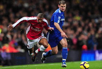 LONDON, ENGLAND - NOVEMBER 29:  Armand Traore of Arsenal challenges Branislav Ivanovic of Chelsea during the Barclays Premier League match between Arsenal and Chelsea at the Emirates Stadium on November 29, 2009 in London, England.  (Photo by Mike Hewitt/Getty Images)