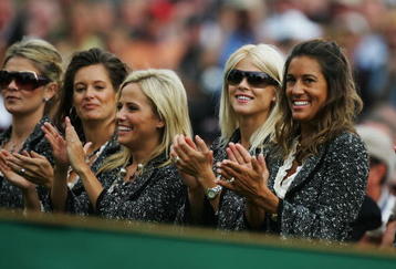 KILDARE, IRELAND - SEPTEMBER 21:  Amy Campbell (L),Tabitha Furyk, Amy Mickelson, Elin Woods and Melissa Lehman (R) applaud during the Opening Ceremony of the 2006 Ryder Cup at The K Club on September 21, 2006 in Straffan, Co. Kildare, Ireland.  (Photo by David Cannon/Getty Images)