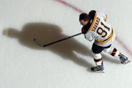 UNIONDALE, NY - APRIL 12:  Marc Savard #91 of the Boston Bruins warms up before playing the New York Islanders on April 12, 2009 at Nassau Coliseum in Uniondale, New York.  (Photo by Jim McIsaac/Getty Images)