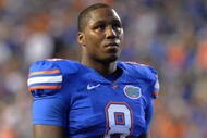 GAINESVILLE, FL - NOVEMBER 7: Defensive end Carlos Dunlap #8 of the Florida Gators sets on defense against the Vanderbilt Commodores on November 7, 2009 at Ben Hill Griffin Stadium in Gainesville, Florida. (Photo by Al Messerschmidt/Getty Images)