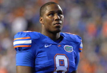 GAINESVILLE, FL - NOVEMBER 7: Defensive end Carlos Dunlap #8  of the Florida Gators sets on defense against the Vanderbilt Commodores  on November 7, 2009 at Ben Hill Griffin Stadium in Gainesville, Florida.  (Photo by Al Messerschmidt/Getty Images) 