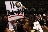 NEW ORLEANS - NOVEMBER 30: Pierre Thomas #23 of the New Orleans Saints celebrates with fans after their 38-17 win over the New England Patriots at Louisana Superdome on November 30, 2009 in New Orleans, Louisiana. (Photo by Scott Halleran/Getty Images)