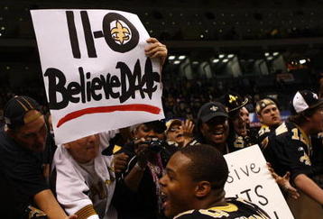 NEW ORLEANS - NOVEMBER 30: Pierre Thomas #23 of the New Orleans Saints celebrates with fans after their 38-17 win over the New England Patriots at Louisana Superdome on November 30, 2009 in New Orleans, Louisiana. (Photo by Scott Halleran/Getty Images)