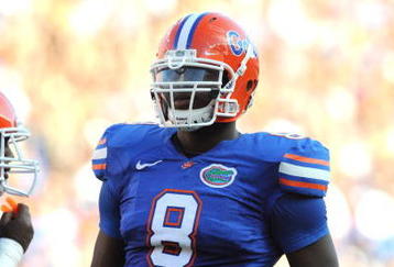 GAINESVILLE, FL - OCTOBER 17: Defensive end Carlos Dunlap #8 of the Florida Gators sets on defense against the University of Arkansas Razorbacks October 17, 2009 at Ben Hill Griffin Stadium in Gainesville, Florida.  (Photo by Al Messerschmidt/Getty Images) 