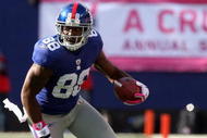 EAST RUTHERFORD, NJ - OCTOBER 11: Hakeem Nicks #88 of the New York Giants runs the ball against the Oakland Raiders on October 11, 2009 at Giants Stadium in East Rutherford, New Jersey. The Giants defeated the Raiders 44-7. (Photo by Jim McIsaac/Getty Images)