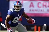 EAST RUTHERFORD, NJ - OCTOBER 11:  Hakeem Nicks #88 of the New York Giants runs the ball against the Oakland Raiders on October 11, 2009 at Giants Stadium in East Rutherford, New Jersey. The Giants defeated the Raiders 44-7.  (Photo by Jim McIsaac/Getty Images)