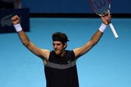 LONDON, ENGLAND - NOVEMBER 28:  Juan Martin Del Potro of Argentina celebrates winning the match during the men's singles semi final match against Robin Soderling of Swedenduring the Barclays ATP World Tour Finals at the O2 Arena on November 28, 2009 in London, England.  (Photo by Julian Finney/Getty Images)
