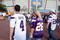 MINNEAPOLIS, MN - AUGUST 21: A fan wears a Brett Favre and Adrian Peterson jersey as they walk to the Metrodome prior to the game against the Minnesota Vikings against the Kansas City Chiefs at Hubert H. Humphrey Metrodome on August 21, 2009 in Minneapolis, Minnesota. (Photo by Scott Boehm/Getty Images)