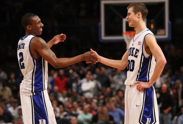NEW YORK - NOVEMBER 27: Nolan Smith #2 of the Duke Blue Devils celebrates the win with teammate Jon Scheyer #30 against the Connecticut Huskies during the Championship game at Madison Square Garden on November 27, 2009 in New York, New York.  (Photo by Nick Laham/Getty Images)