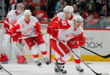 DENVER - OCTOBER 24:  Darren Helm #43 of the Detroit Red Wings as Pavel Datsyuk #13, Nicklas Lidstrom #5 and goalie Jimmy Howard #35 follow the play against the Colorado Avalanche during NHL action at the Pepsi Center on October 24, 2009 in Denver, Colorado. The Avalanche defeated the Red Wings 3-1.  (Photo by Doug Pensinger/Getty Images)