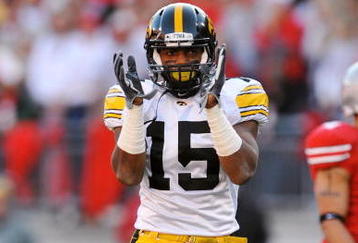 COLUMBUS, OH - NOVEMBER 14:  Split end Derrell Johnson-Koulianos #15 of the Iowa Hawkeyes celebrates after making a catch against the Ohio State Buckeyes at Ohio Stadium on November 14, 2009 in Columbus, Ohio.  (Photo by Jamie Sabau/Getty Images)