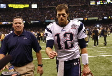 NEW ORLEANS - NOVEMBER 30: Tom Brady #12 of the New England Patriots walks off the field dejected after they lost 38-17 against the New Orleans Saints at Louisana Superdome on November 30, 2009 in New Orleans, Louisiana. (Photo by Scott Halleran/Getty Images)