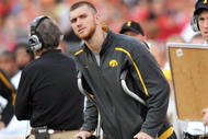 COLUMBUS, OH - NOVEMBER 14:  Injured quarterback Ricky Stanzi #12 of the Iowa Hawkeyes watches from the sidelines as his team plays the Ohio State Buckeyes at Ohio Stadium on November 14, 2009 in Columbus, Ohio.  (Photo by Jamie Sabau/Getty Images)