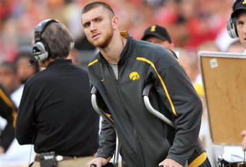 COLUMBUS, OH - NOVEMBER 14:  Injured quarterback Ricky Stanzi #12 of the Iowa Hawkeyes watches from the sidelines as his team plays the Ohio State Buckeyes at Ohio Stadium on November 14, 2009 in Columbus, Ohio.  (Photo by Jamie Sabau/Getty Images)