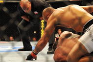 PHILADELPHIA - AUGUST 08:  (Top) Lightweight champion BJ Penn battles Kenny Florian during their lightweight championship title bout at UFC 101: Declaration at the Wachovia Center on August 8, 2009 in Philadelphia, Pennsylvania.  (Photo by Jon Kopaloff/Getty Images)