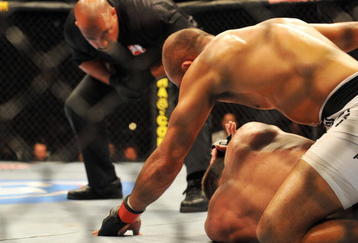 PHILADELPHIA - AUGUST 08:  (Top) Lightweight champion BJ Penn battles Kenny Florian during their lightweight championship title bout at UFC 101: Declaration at the Wachovia Center on August 8, 2009 in Philadelphia, Pennsylvania.  (Photo by Jon Kopaloff/Getty Images)