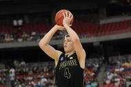 GLENDALE, AZ - MARCH 26:  Forward Robbie Hummel #4 of the Purdue Boilermakers takes a shot against the Connenticut Huskies in the Sweet 16 of the NCAA Division I Men's Basketball Tournament at the University of Phoenix Stadium on March 26, 2009 in Glendale, Arizona.  (Photo by Ronald Martinez/Getty Images)