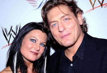 HOLLYWOOD - AUGUST 21:  Wrestlers Katie Lee and  William Regal arrive at the WWE's SummerSlam Kickoff Party at H-Wood Club on August 21, 2009 in Hollywood, California.  (Photo by Frazer Harrison/Getty Images)