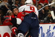 OTTAWA, ON - NOVEMBER 23:  Alex Ovechkin #8 of the Washington Capitals takes a roughing penalty for this high hit on Chris Campoli #14 of the Ottawa Senators in a game at Scotiabank Place on November 23, 2009 in Ottawa, Canada. (Photo by Phillip MacCallum/Getty Images)