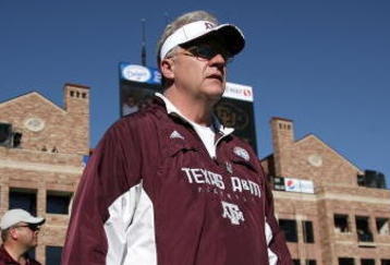 BOULDER, CO - NOVEMBER 07:  Head coach Mike Sherman of the Texas A&M Aggies enters the field for the second half as he leads his team against the Colorado Buffaloes during NCAA college football action at Folsom Field on November 7, 2009 in Boulder, Colorado. Colorado defeated Texas A&M 35-34.  (Photo by Doug Pensinger/Getty Images)