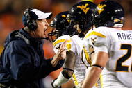 AUBURN, AL - SEPTEMBER 19:  Head coach Bill Stewart of the West Virginia Mountaineers against the Auburn Tigers at Jordan-Hare Stadium on September 19, 2009 in Auburn, Alabama.  (Photo by Kevin C. Cox/Getty Images)