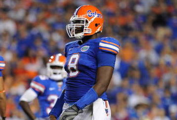 GAINESVILLE, FL - NOVEMBER 7: Defensive end Carlos Dunlap #8  of the Florida Gators sets on defense against the Vanderbilt Commodores  on November 7, 2009 at Ben Hill Griffin Stadium in Gainesville, Florida.  (Photo by Al Messerschmidt/Getty Images) 