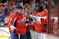 WASHINGTON - NOVEMBER 25:  Alex Ovechkin #8 of the Washington Capitals celebrates with teammates after scoring in the first period against the Buffalo Sabres at the Verizon Center on November 25, 2009 in Washington, DC.  (Photo by Greg Fiume/Getty Images)