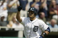 DETROIT - AUGUST 8:  Ivan Rodriguez #7 of the Detroit Tigers points to the sky as he runs to the plate after hitting a solo home run against the Boston Red Sox in the first inning of the game on August 8, 2004 at Comerica Park in Detroit, Michigan.  The Red Sox defeated the Tigers 11-9.  (Photo by Tom Pidgeon/Getty Images)