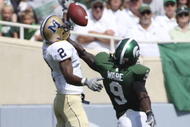 EAST LANSING, MI - SEPTEMBER 05: Defensive back Jeremy Ware #9 of the Michigan State Spartans defends the pass against wide receiver Elvis Akpla #2 of Montana State during the game on September 5, 2009 at Spartan Stadium in East Lansing, Michigan.  (Photo by Leon Halip/Getty Images)