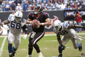 HOUSTON - NOVEMBER 29:  Quarterback Matt Schaub #8 of the Houston Texans releases the ball as he is sacked by defensive tackle Eric Foster #68 and defensive end  Robert Mathis #98 at Reliant Stadium on November 29, 2009 in Houston, Texas.  (Photo by Bob Levey/Getty Images)