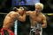 CHICAGO- OCTOBER 25: Josh Koscheck (R) punches Thiago Alves in a Welterweight bout  at UFC's Ultimate Fight Night at Allstate Arena on October 25, 2008 in Chicago, Illinois. (Photo by Tasos Katopodis/Getty Images)