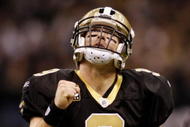 NEW ORLEANS - NOVEMBER 30: Quarterback Drew Brees #9 of the New Orleans Saints celebrates after a touchdown against the New England Patriots at Louisana Superdome on November 30, 2009 in New Orleans, Louisiana. (Photo by Chris Graythen/Getty Images)