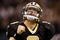 NEW ORLEANS - NOVEMBER 30: Quarterback Drew Brees #9 of the New Orleans Saints celebrates after a touchdown against the New England Patriots at Louisana Superdome on November 30, 2009 in New Orleans, Louisiana.  (Photo by Chris Graythen/Getty Images)