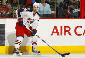 OTTAWA - NOVEMBER 26:  Kristian Huselius #20 of the Columbus Blue Jackets looks to make a pass play against the Ottawa Senators during their game at Scotiabank Place on November 26, 2009 in Ottawa, Ontario, Canada. The Senators defeated the Blue Jackets 2-1. (Photo by Phillip MacCallum/Getty Images)
