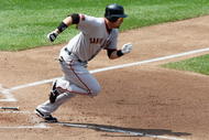 NEW YORK - AUGUST 16: Travis Ishikawa #10 of the San Francisco Giants runs against the New York Mets on August 16, 2009 at Citi Field in the Flushing neighborhood of the Queens borough of New York City. (Photo by Jim McIsaac/Getty Images)