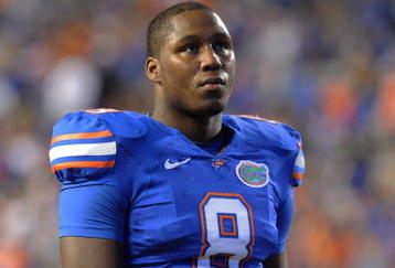 GAINESVILLE, FL - NOVEMBER 7: Defensive end Carlos Dunlap #8  of the Florida Gators sets on defense against the Vanderbilt Commodores  on November 7, 2009 at Ben Hill Griffin Stadium in Gainesville, Florida.  (Photo by Al Messerschmidt/Getty Images) 