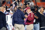 MIAMI GARDENS, FL - JANUARY 3:  Head Coach Joe Paterno of the Penn State Nittany Lions talks with Head Coach Bobby Bowden of the Florida State Seminoles during the Fed Ex Orange Bowl at Dolphins Stadium on January 3, 2005 in Miami Gardens, Florida. The Lions won 26-23 in triple overtime. (Photo by Scott Halleran/Getty Images)