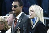 SUTTON COLDFIELD - SEPTEMBER 26:  Golfer Tiger Woods poses with girlfriend Elin Nordegren during the opening Ceremony for the 34th Ryder Cup on September 26, 2002 in Sutton Coldfield, England. (Photo by Andrew Redington/Getty Images)