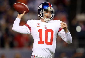 DENVER - NOVEMBER 26:  Quarterback Eli Manning #10 of the New York Giants delivers a pass against the Denver Broncos during NFL action at Invesco Field at Mile High on November 26, 2009 in Denver, Colorado.  (Photo by Doug Pensinger/Getty Images)