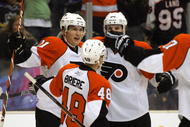 LOS ANGELES, CA - NOVEMBER 18:  James van Riemsdyk #21 of the Philadelphia Flyers celebrates his third period eventual game-winning goal with teammates Daniel Briere #48 and Braydon Coburn #5 against the Los Angeles Kings during the NHL game at the Staples Center on November 18, 2009 in Los Angeles, California. The Flyers defeated the Kings 3-2.  (Photo by Victor Decolongon/Getty Images)