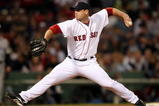 BOSTON - SEPTEMBER 29:  Billy Wagner #13 of the Boston Red Sox delivers a pitch in the eighth inning against the Toronto Blue Jays on September 29, 2009 at Fenway Park in Boston, Massachusetts.  (Photo by Elsa/Getty Images)